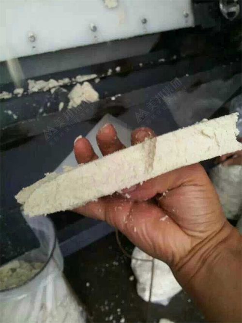 用帶式壓榨機脫水處理后的豆腐渣